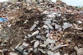 Feed material from construction and demolition waste