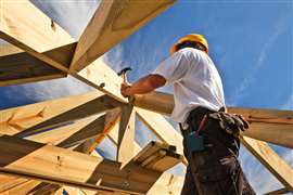 Roof construction work (Image: Adobe Stock)