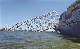 Before the blast: The truss of the Francis Scott Key Bridge pinning the bow of the M/V Dali to the bottom of the Patapsco River.