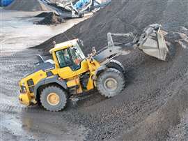 Volvo L120H adapted to allow disabled operator to drive