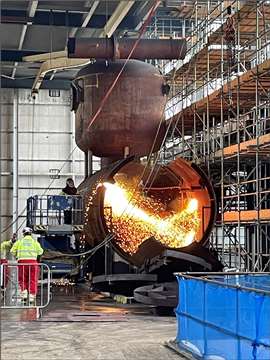 Erith workers reducing the size of the boilers by way of torch cutting