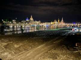 The riverbank at night, now cleard of the collapsed bridge