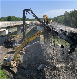 Sessler excavators taking down a bridge