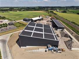 Aerial view of solar panels on top of Valdeau'Mat's facility