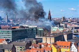 Smoke from the fire at the Old Stock Exchange in Copenhagen seen from a distance