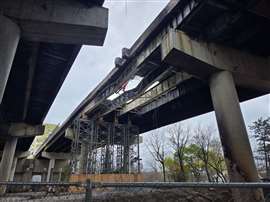 From beneath the bridge, the damage can be seen