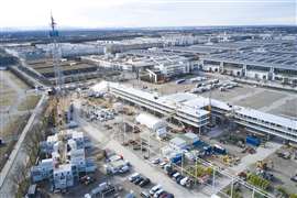 Drone image of the Liebherr administrative building, where Liebherr will welcome clients. In the background, you can see the 'container castle' and halls of Messe München